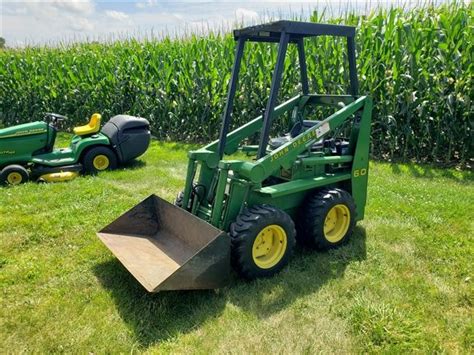 john deere 60 skid steer value|skid steer lift capacity.